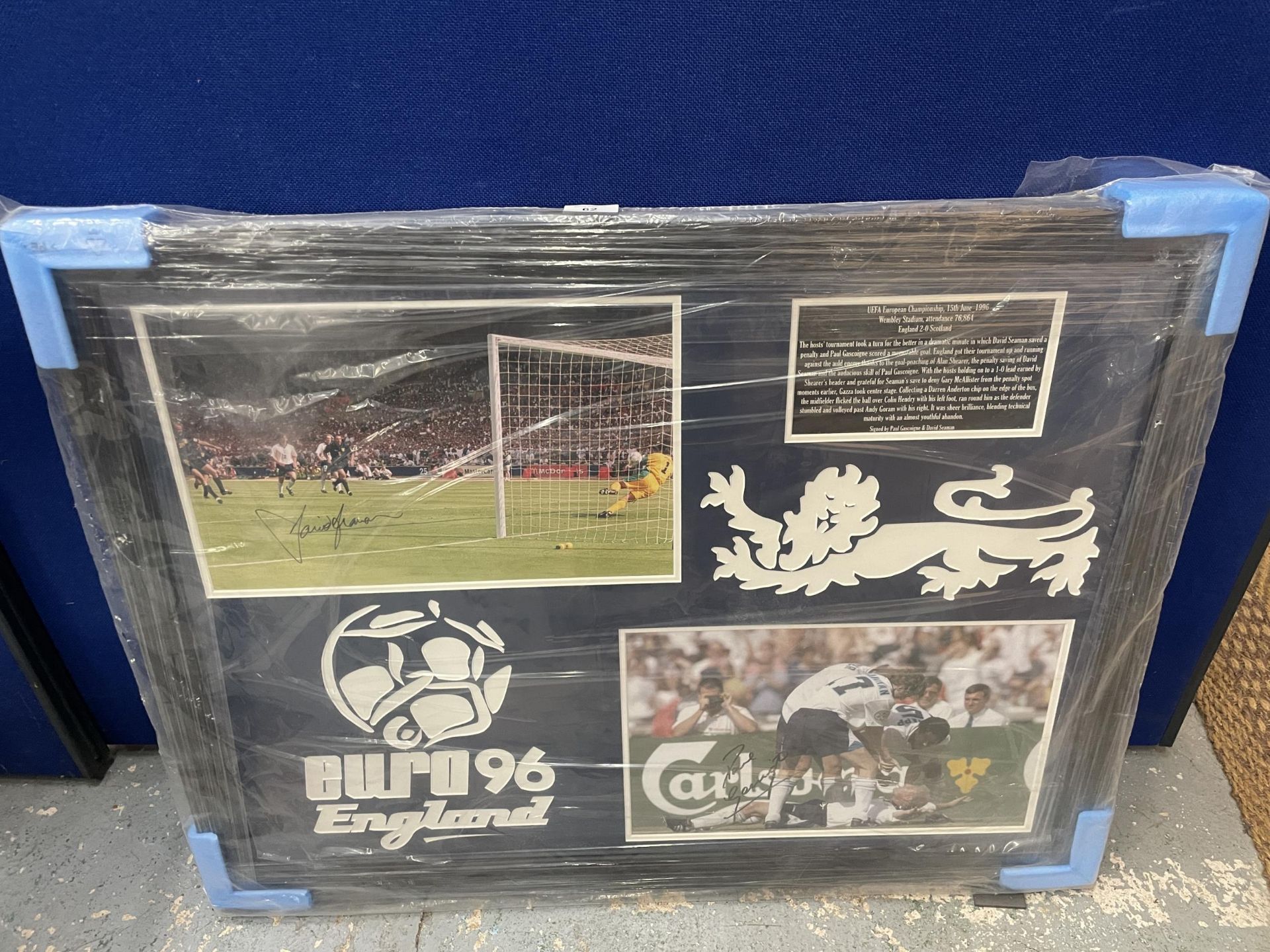 A FRAMED EURO 1996 SIGNED PHOTO BY PAUL GASCOIGNE AND DAVID SEAMAN, WITH ALL STAR SIGNINGS