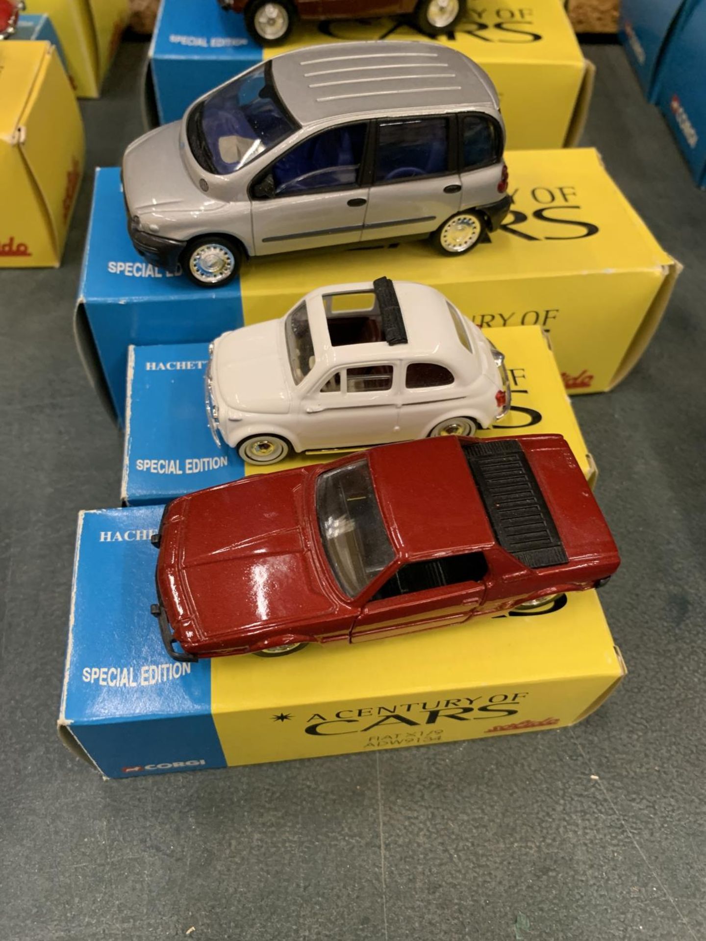 THREE BOXED CORGI 'A CENTURY OF CARS' TO INCLUDE A FIAT 500, X19 AND A MULTIPLA