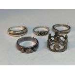 FIVE SILVER RINGS