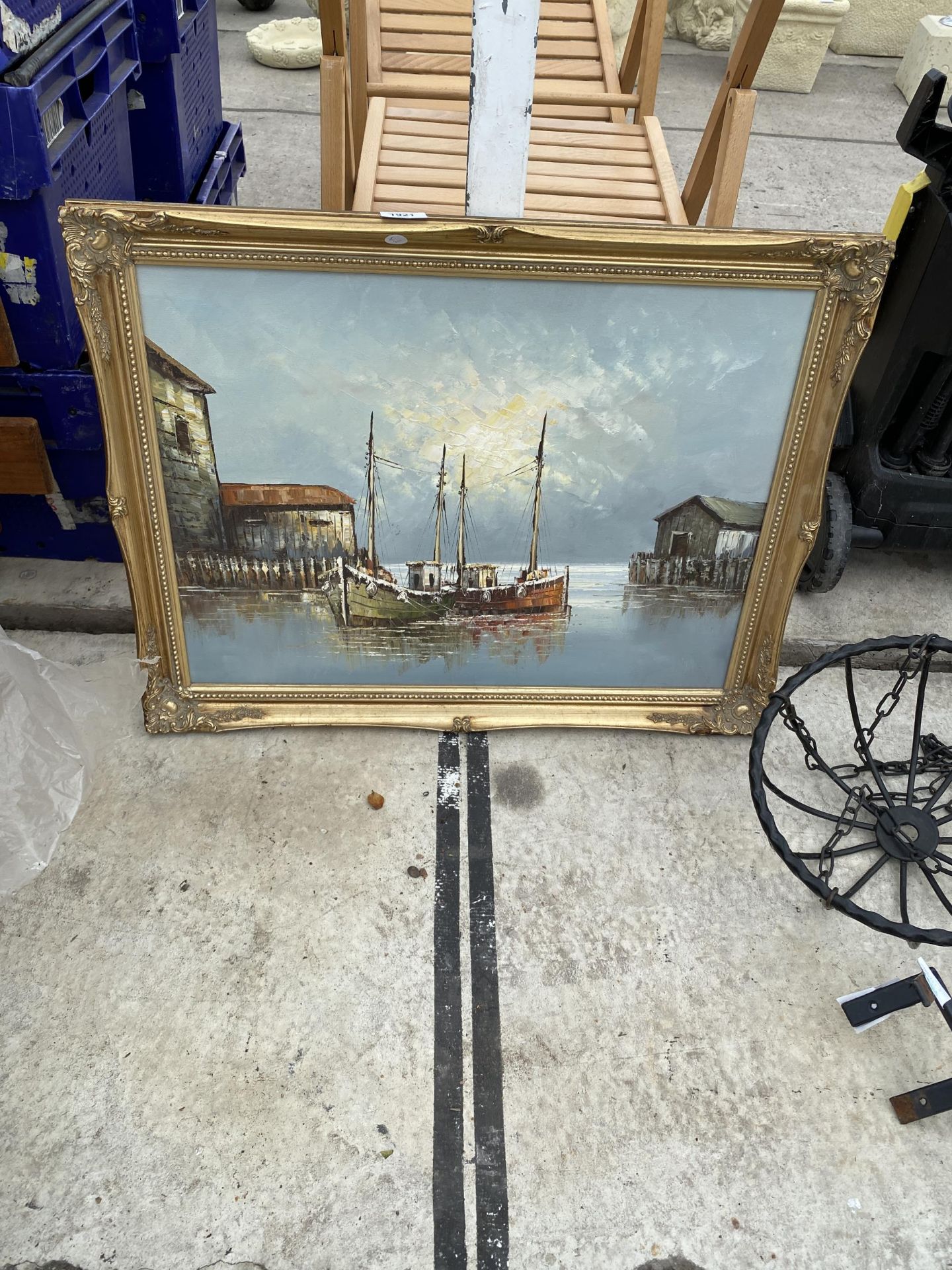 A GILT FRAMED OIL ON CANVAS OF A FISHING BOAT