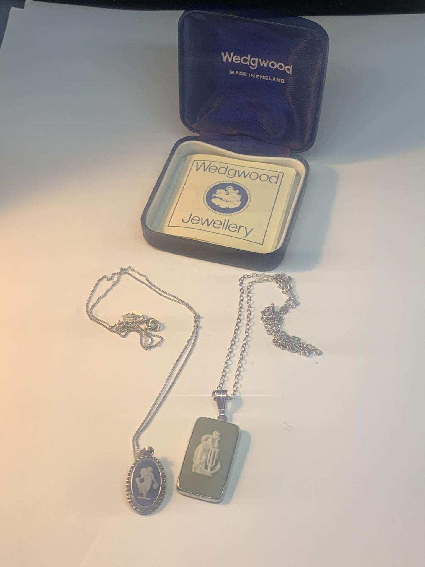 TWO SILVER NECKLACES WITH WEDGEWOOD JASPERWARE PENDANTS IN A PRESENTATION BOX