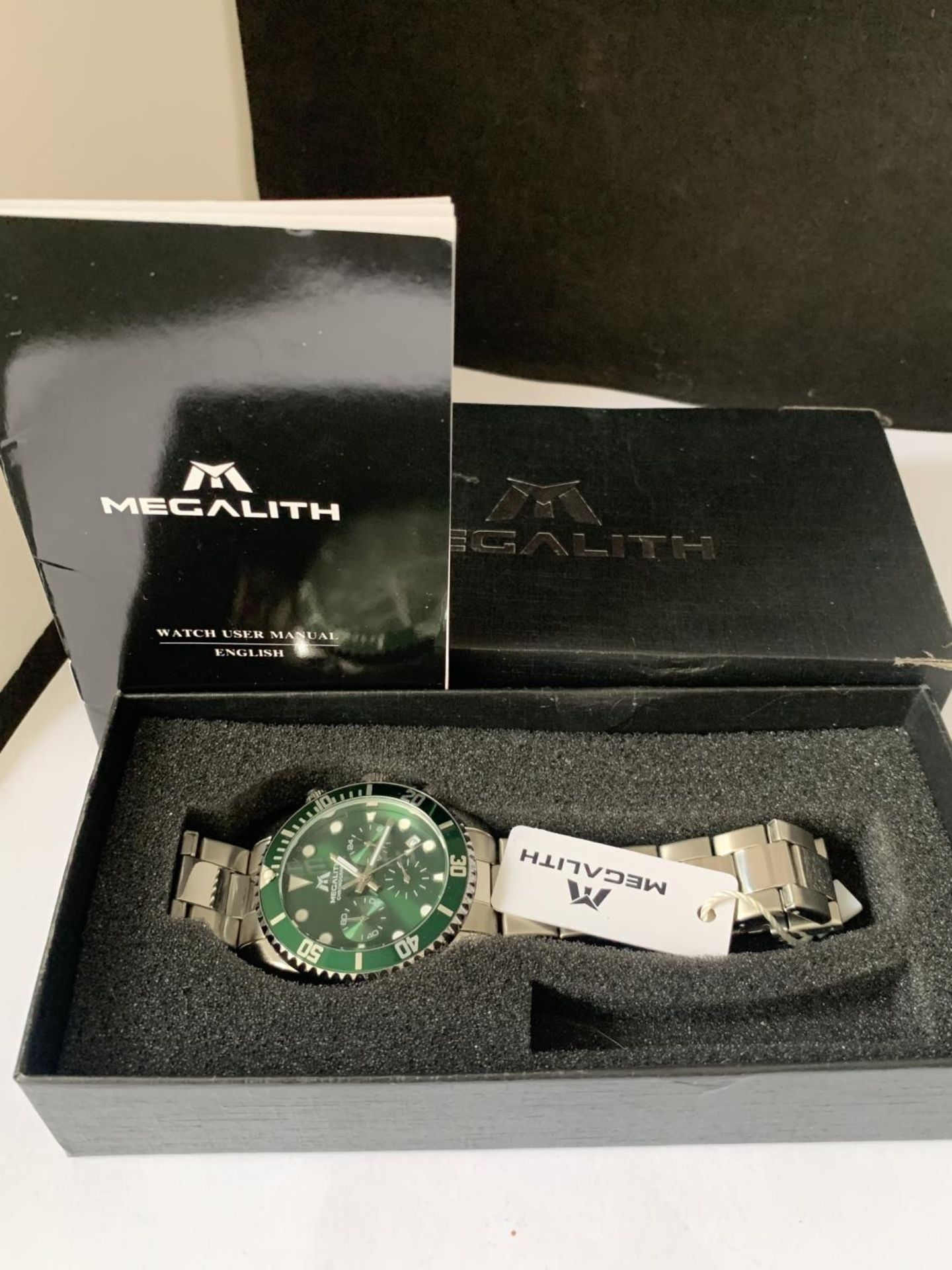 AN AS NEW AND BOXED MEGALITH CHRONOGRAPH WRIST WATCH SEEN WORKING BUT NO WARRANTY