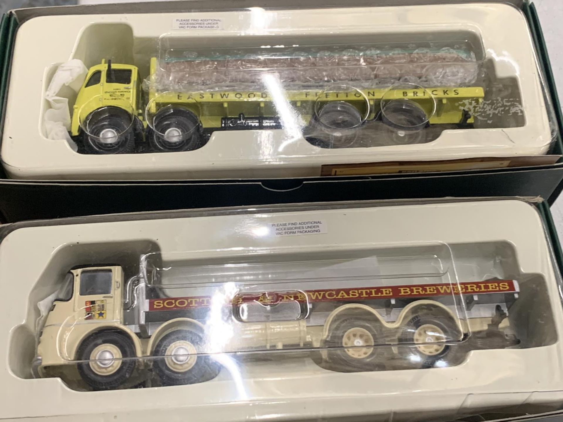 A CORGI EASTWOOD FODEN F6 LORRY AND A SCOTTISH NEWCASTLE ERF KV LORRY