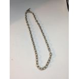 A SILVER T BAR NECKLACE