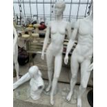 A FEMALE LIFE SIZE MANNEQUIN ON A STAND