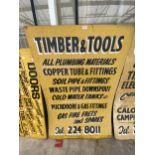 A WOODEN 'TIMBER & TOOLS' SIGN