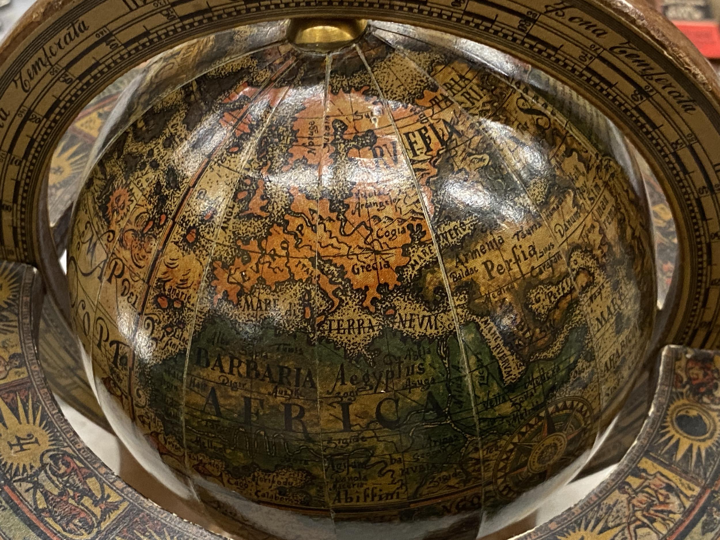 AN ITALIAN WOODEN ROTATING WORLD GLOBE WITH ASTROLOGICAL SIGNS TO THE SIDE, HEIGHT APPROX 23CM - Image 4 of 4