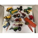 A COLLECTION OF BRITAINS FARM VEHICLES TO INCLUDE TRACTORS, TRAILERS, MACHINES, ETC