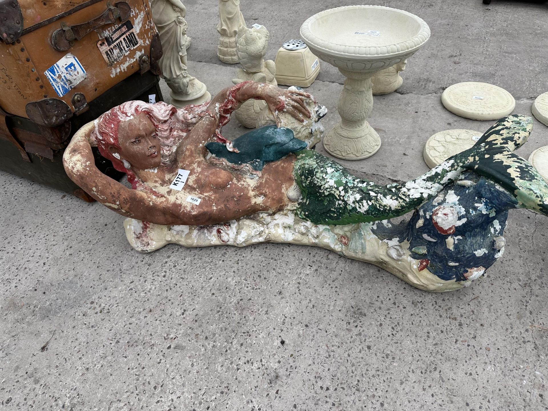 A FIBRE GLASS PAINTED MERMAID TABLE BASE