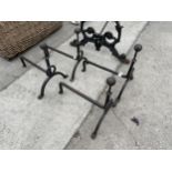 A SET OF FOUR WROUGHT IRON FIRE DOGS