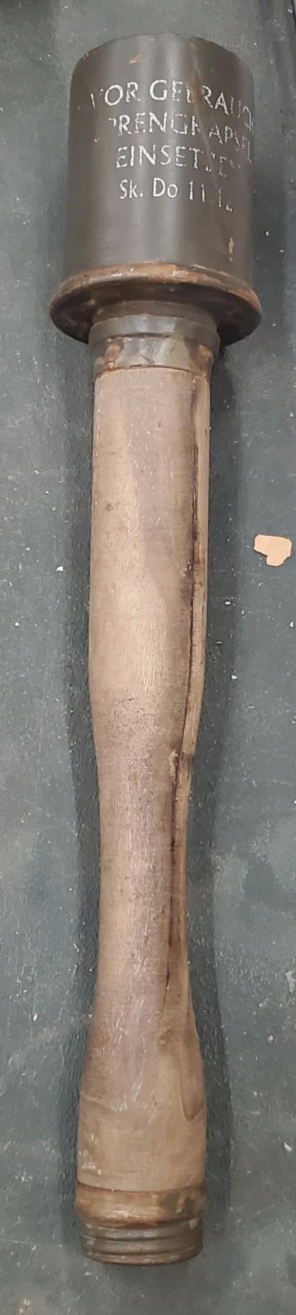 A WORLD WAR II STICK GRENADE