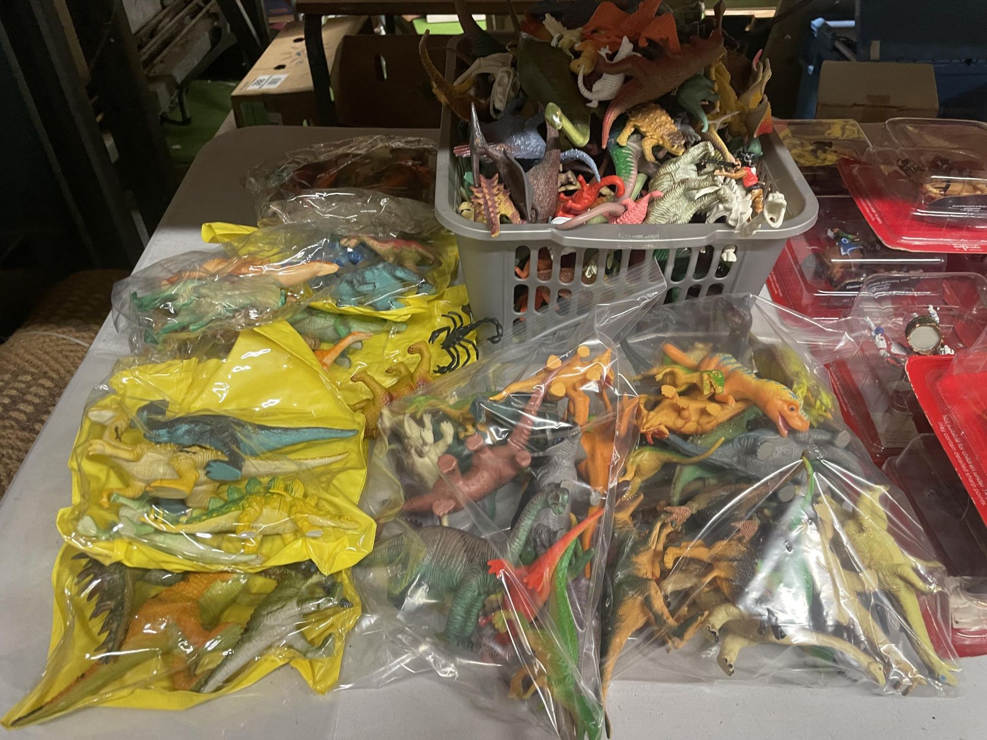A LARGE QUANTITY OF PLASTIC DINOSAURS