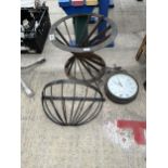 AN OUTDOOR CLOCK, A HAYRACK PLANTER AND A FURTHER METAL TABLE BASE