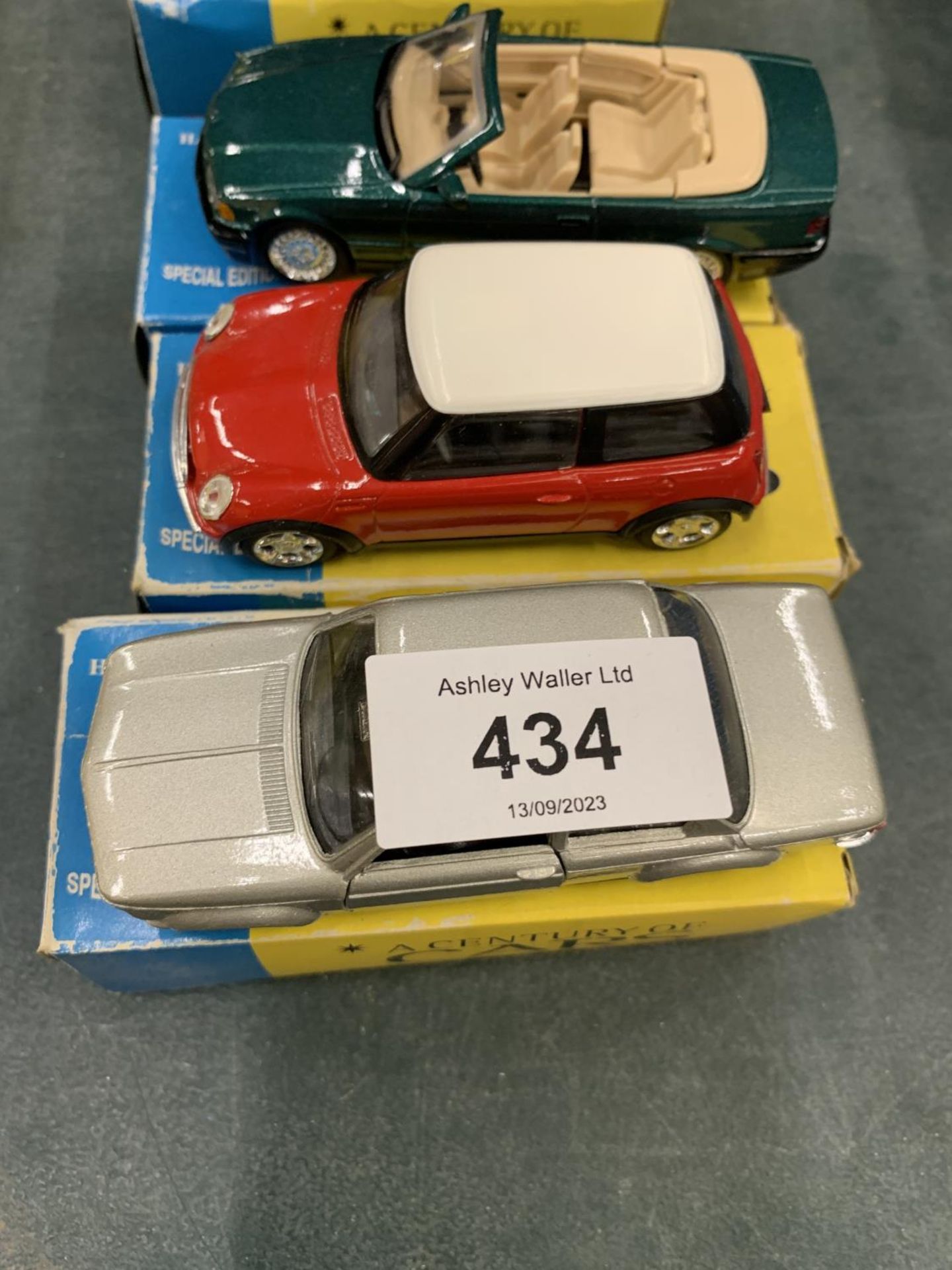 THREE BOXED CORGI 'A CENTURY OF CARS' TO INCLUDE A BMW 3 SERIES, A BMW 2002 TURBO AND A MINI