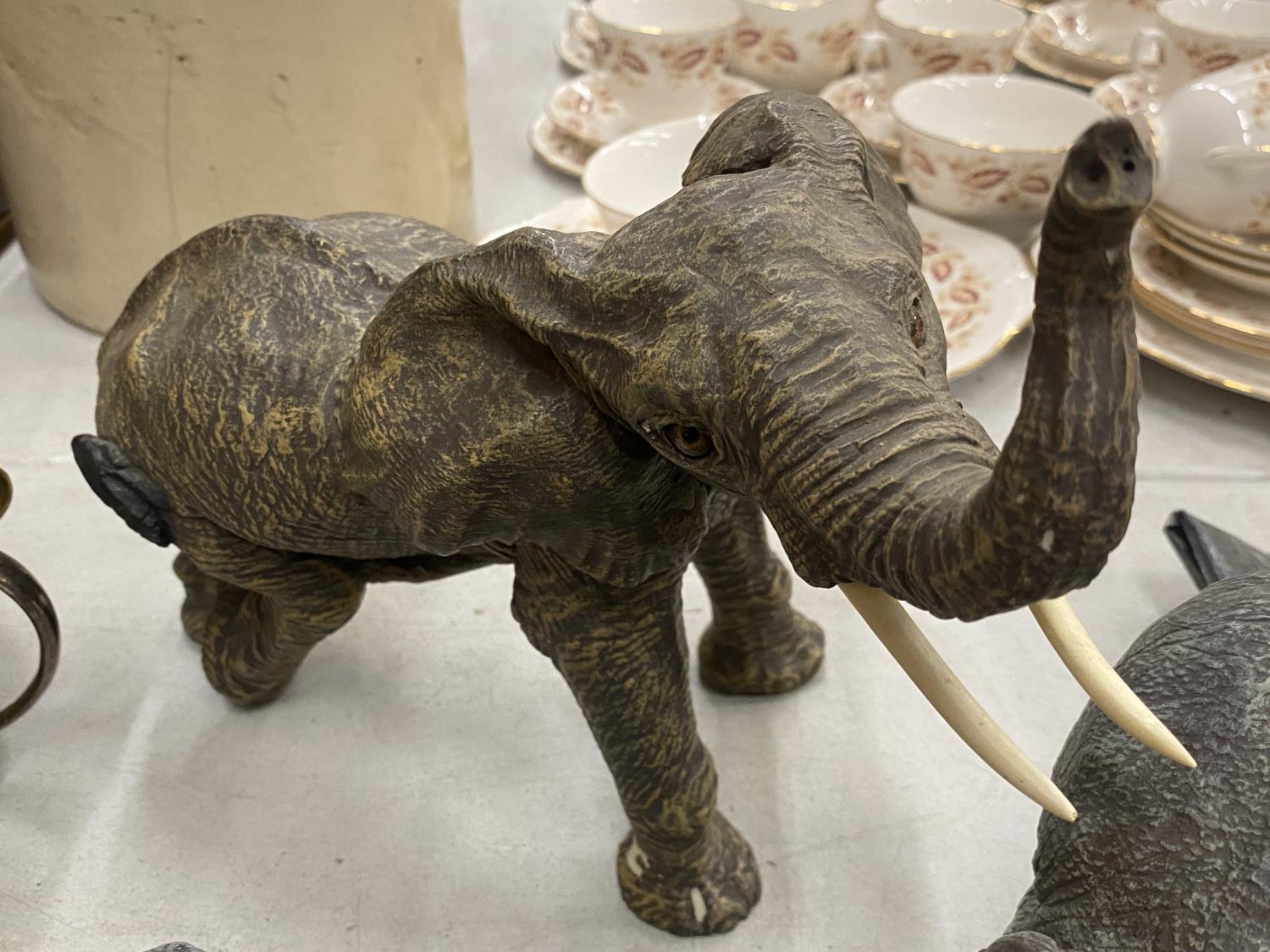 A COLLECTION OF RESIN ELEPHANTS - 8 IN TOTAL TO INCLUDE TUSKERS, RUFF & TUMBLE, HERD, ETC., - Image 5 of 5