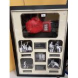 A FRAMED SIR HENRY COOPER O.B.E BOXING MONTAGE WITH SIGNED BOXING GLOVE AND PHOTOS