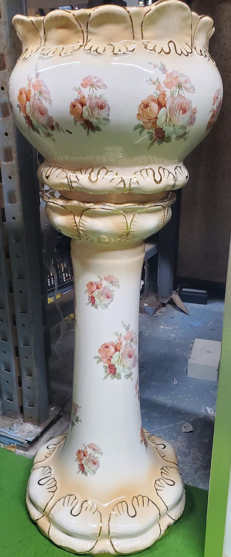 A VINTAGE FLORAL JARDINIERE AND STAND