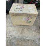 A WOODEN PAINTED LIDDED STORAGE BOX