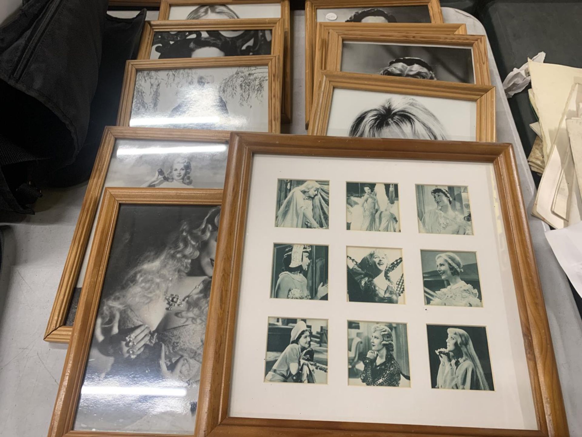 A COLLECTION OF FRAMED PICTURES OF FILM STARS TO INCLUDE MAE WEST, HAYLEY MILLS, JANE RUSSELL,