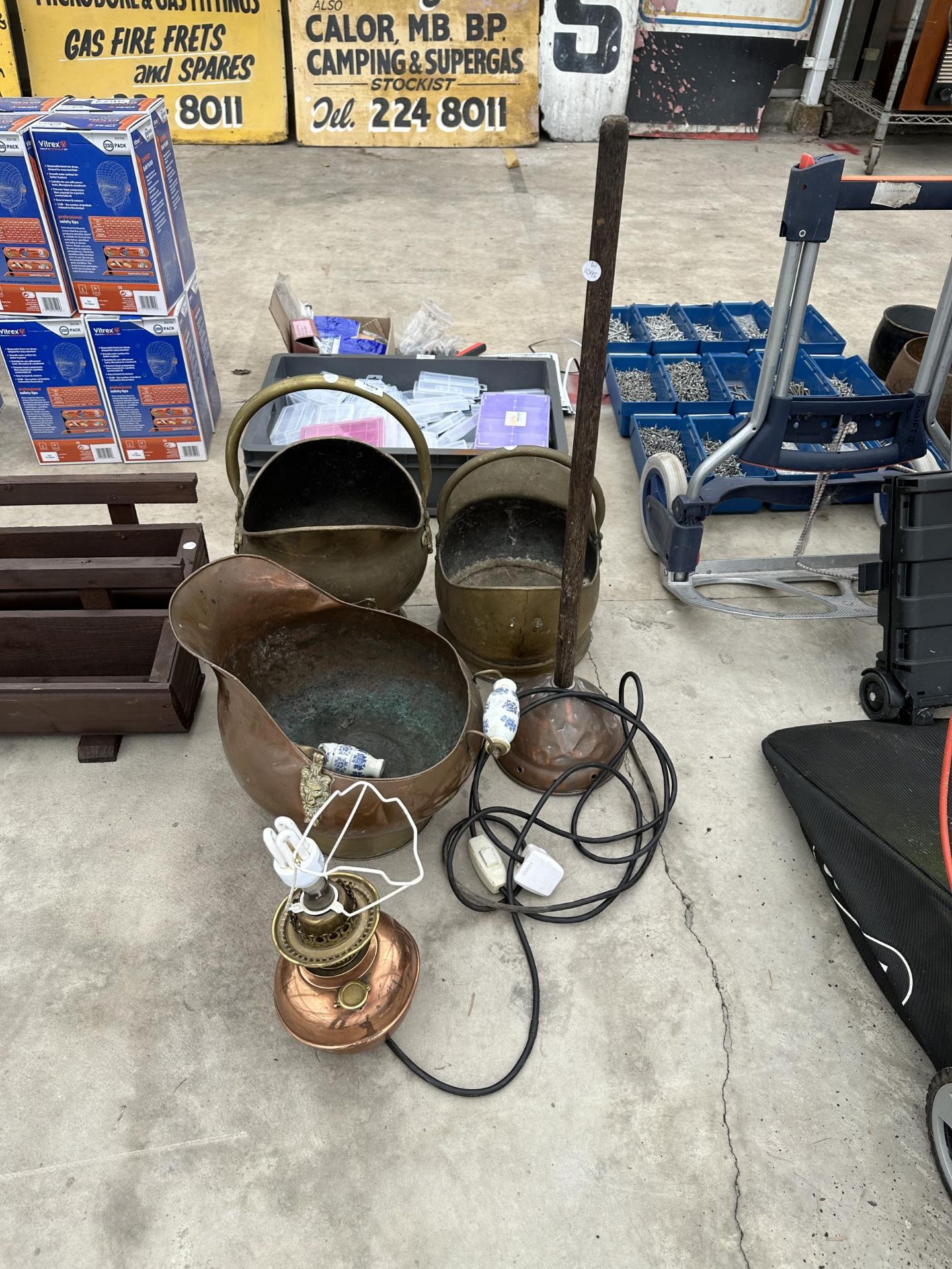 TWO BRASS COAL BUCKETS, A COPPER COAL BUCKET, A LAMP AND A COPPER POSSER
