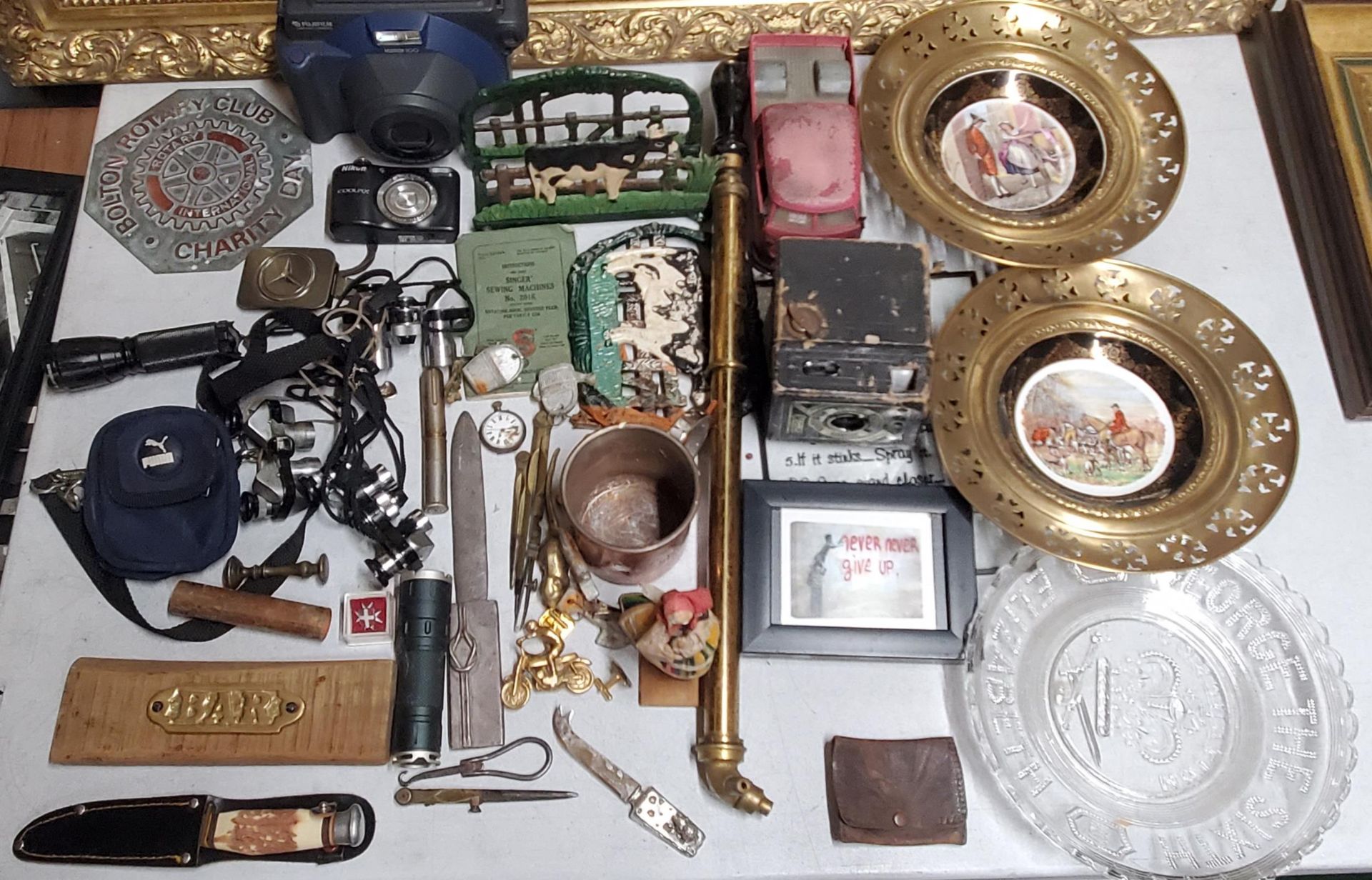 A LARGE MIXED LOT OF ITEMS, BRASS SURROUND PLATES, ROTARY CLUB SIGN, CAMERAS ETC