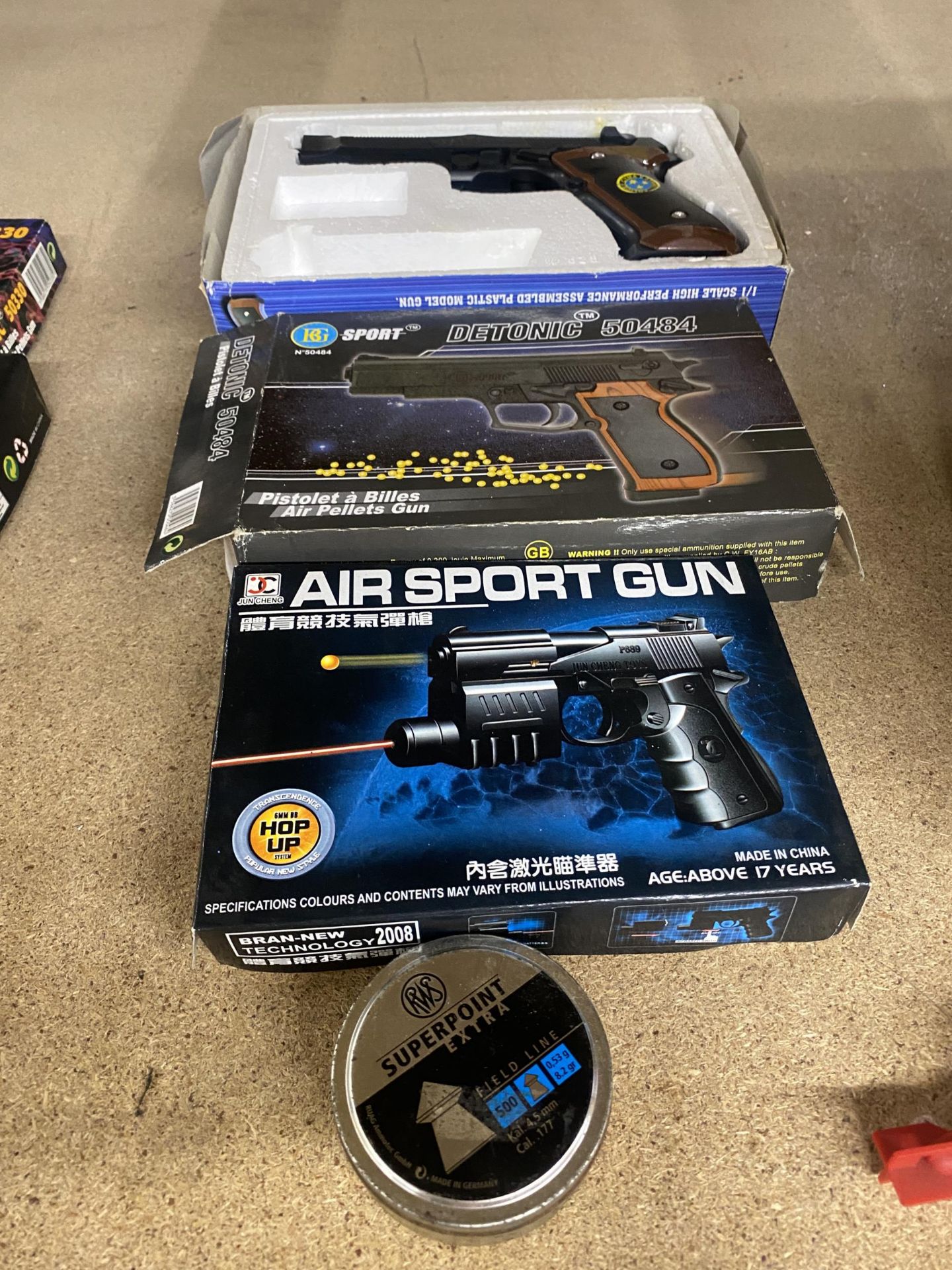A GROUP OF BOXED AIR SPORT BB TOY GUNS