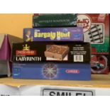 A QUANTITY OF BOARD GAMES TO INCLUDE BARGAIN HUNT, ANTIQUES ROADSHAW, JUNIOR WHO WANTS TO BE A