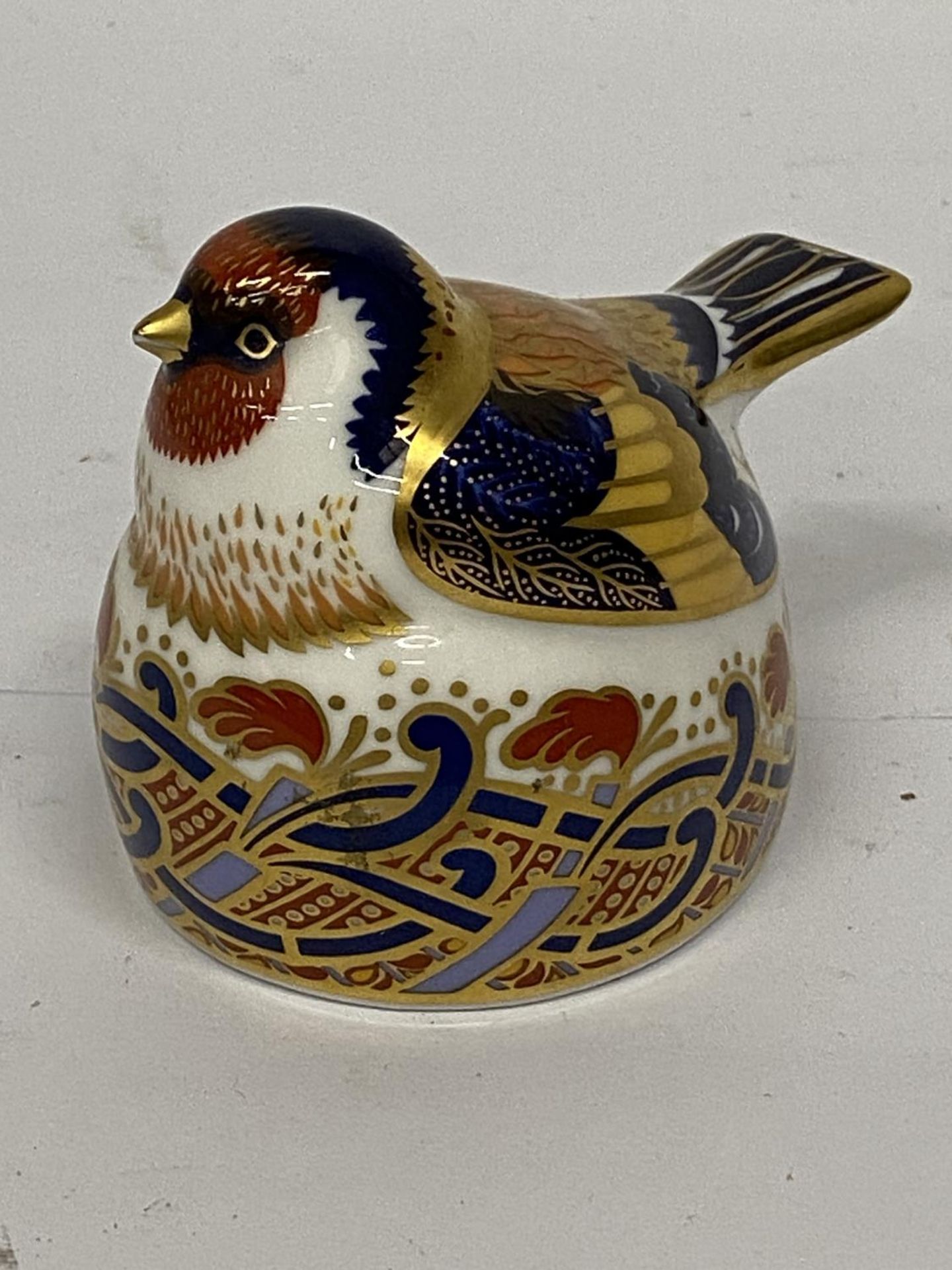 A ROYAL CROWN DERBY NESTING GOLDFINCH