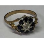 A 9 CARAT GOLD RING WITH DIAMONDS AND SAPPHIRES SIZE N/O