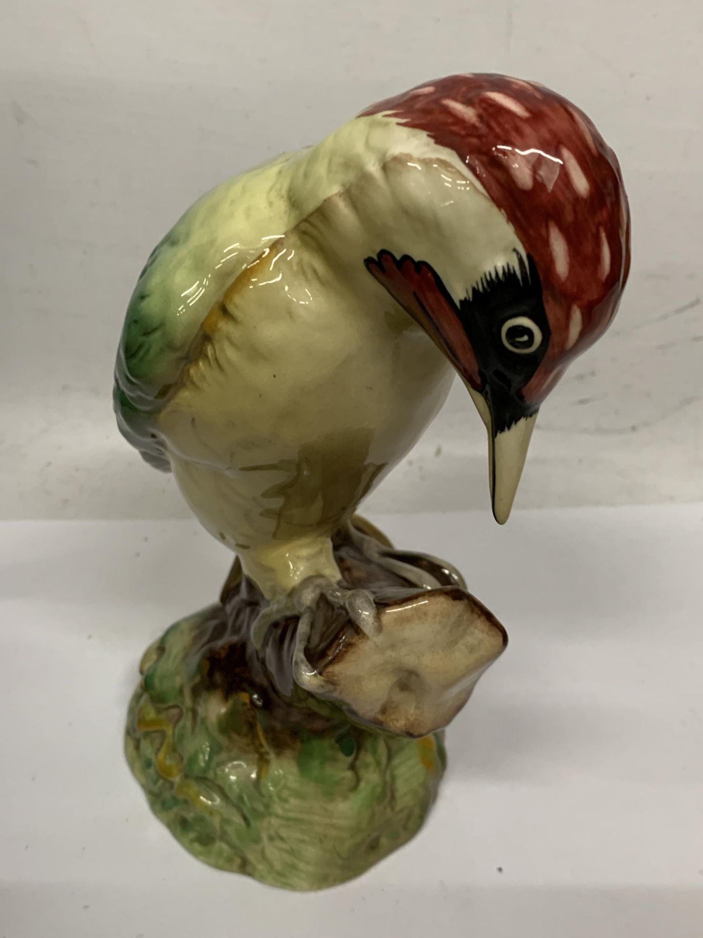 A BESWICK WOODPECKER NO. 1218 BIRD FIGURE