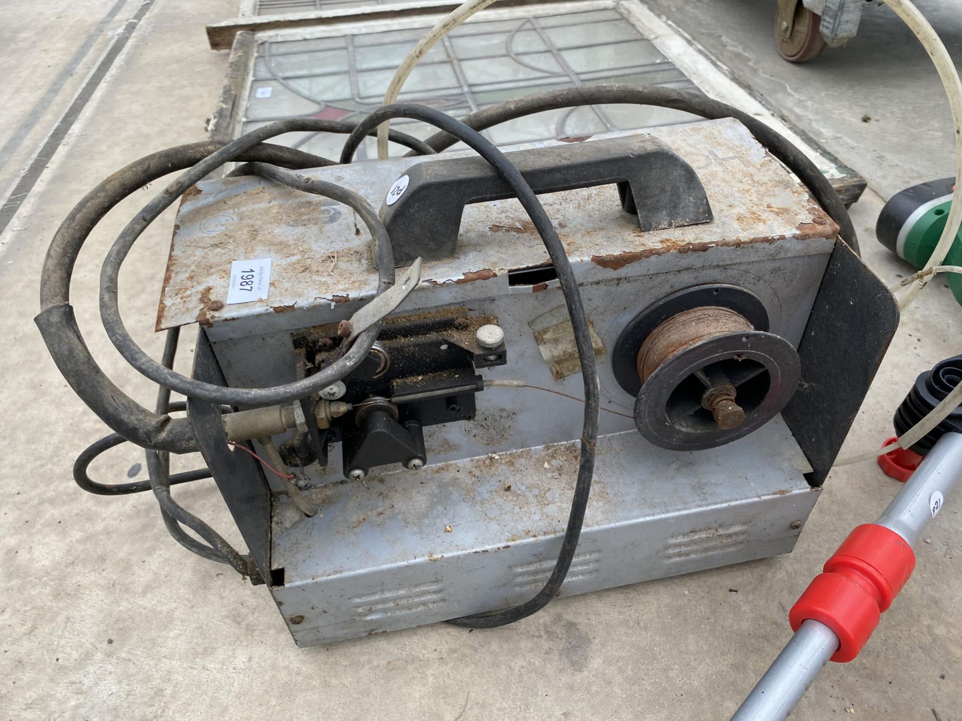 A MIG WELDER AND A BATTERY GRASS STRIMMER - Image 2 of 2