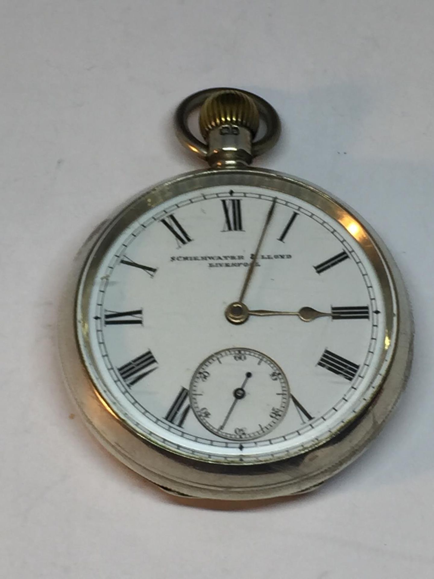 A HALLMARKED BIRMINGHAM SILVER POCKET WATCH SCHIERWATER AND LLOYD, LIVERPOOL, SEEN WORKING