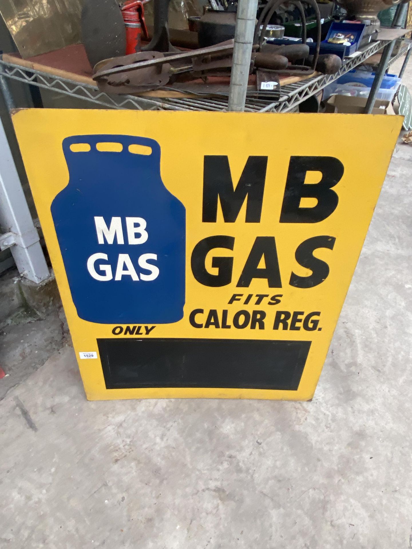 A WOODEN 'MB GAS' SIGN