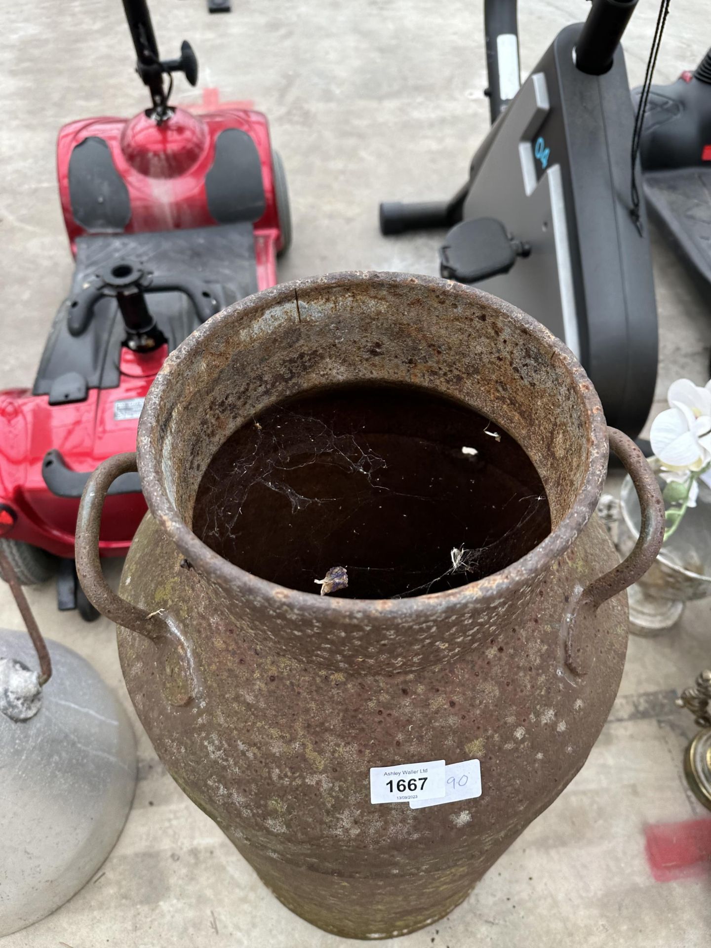 A VINTAGE CAST IRON MILK CHURN - Image 2 of 3