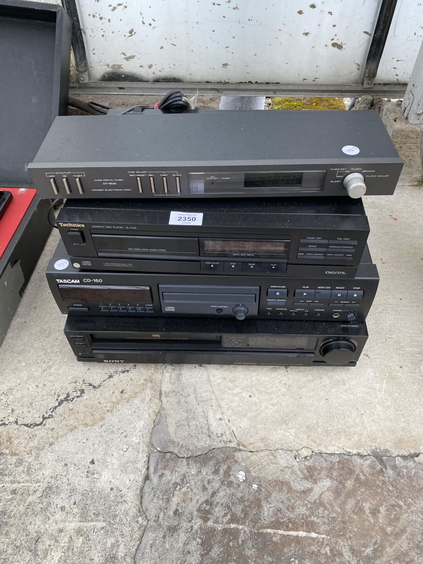 AN ASSORTMENT OF ITEMS TO INCLUDE A SONY VHS PLAYER, A TASCAM CD-160 AND A TECHNICS CD PLAYER ETC