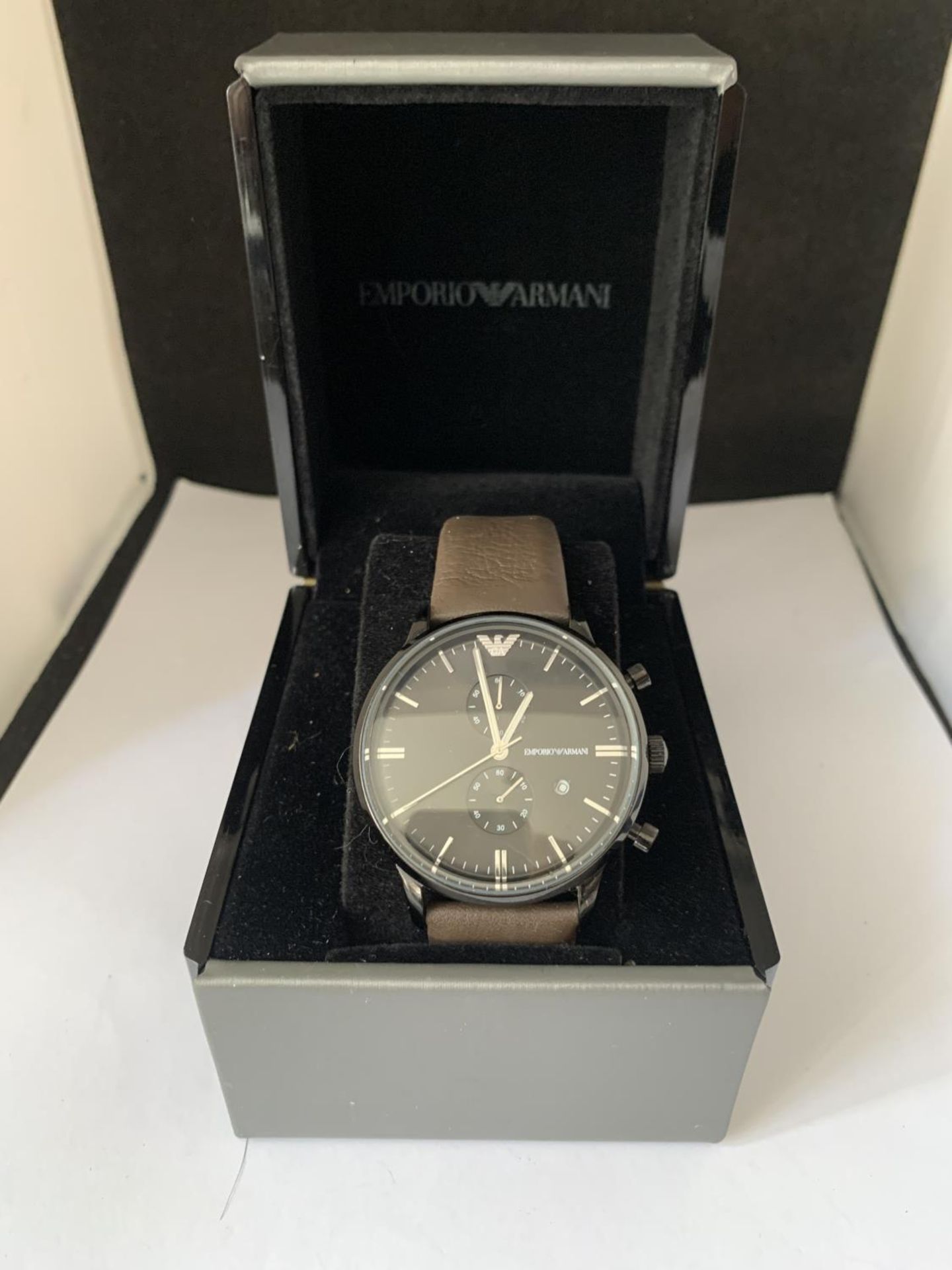 AN AS NEW AND BOXED ARMANI SUB DIAL WRIST WATCH SEEN WORKING BUT NO WARRANTY