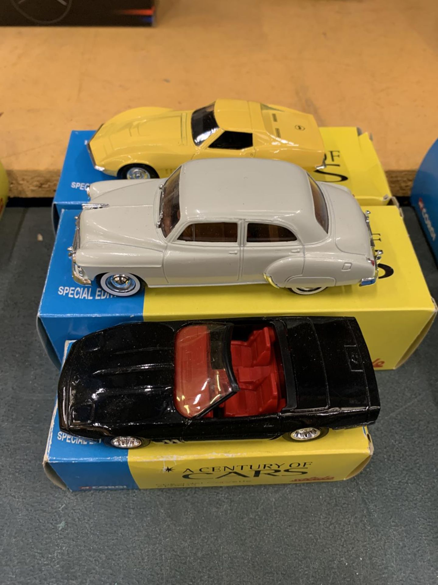 THREE BOXED CORGI 'A CENTURY OF CARS' TO INCLUDE A CHEVROLET CORVETTE, 1950, AND A CORVETTE JNI
