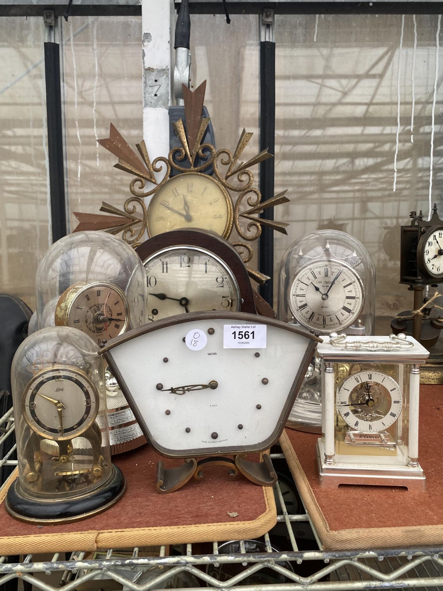 AN ASSORTMENT OF VARIOUS CLOCKS