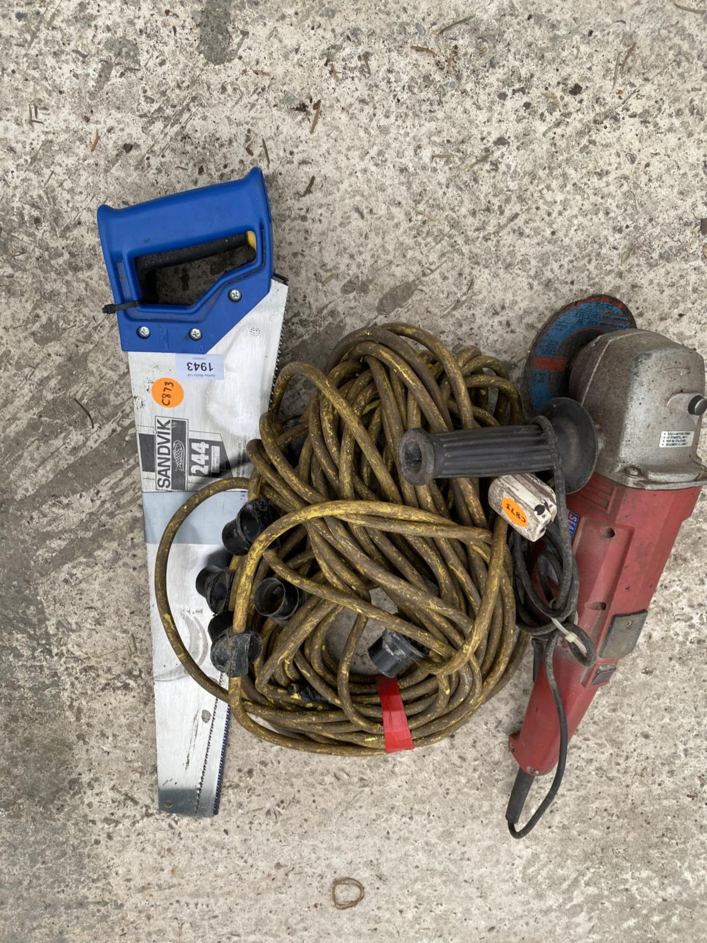 AN ANGLE GRINDER, A STRING OF LIGHTS AND AN ASSORTMENT OF HAND SAWS ETC