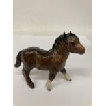 A BESWICK FIGURE OF A SHETLAND PONY