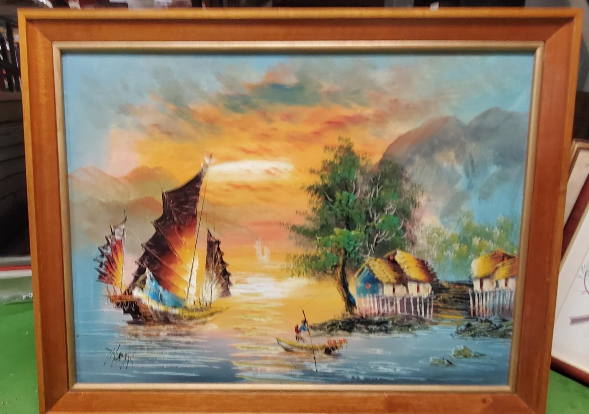 AN OIL ON BOARD OF AN ORIENTAL SEA SCENE, 69CM X 54CM