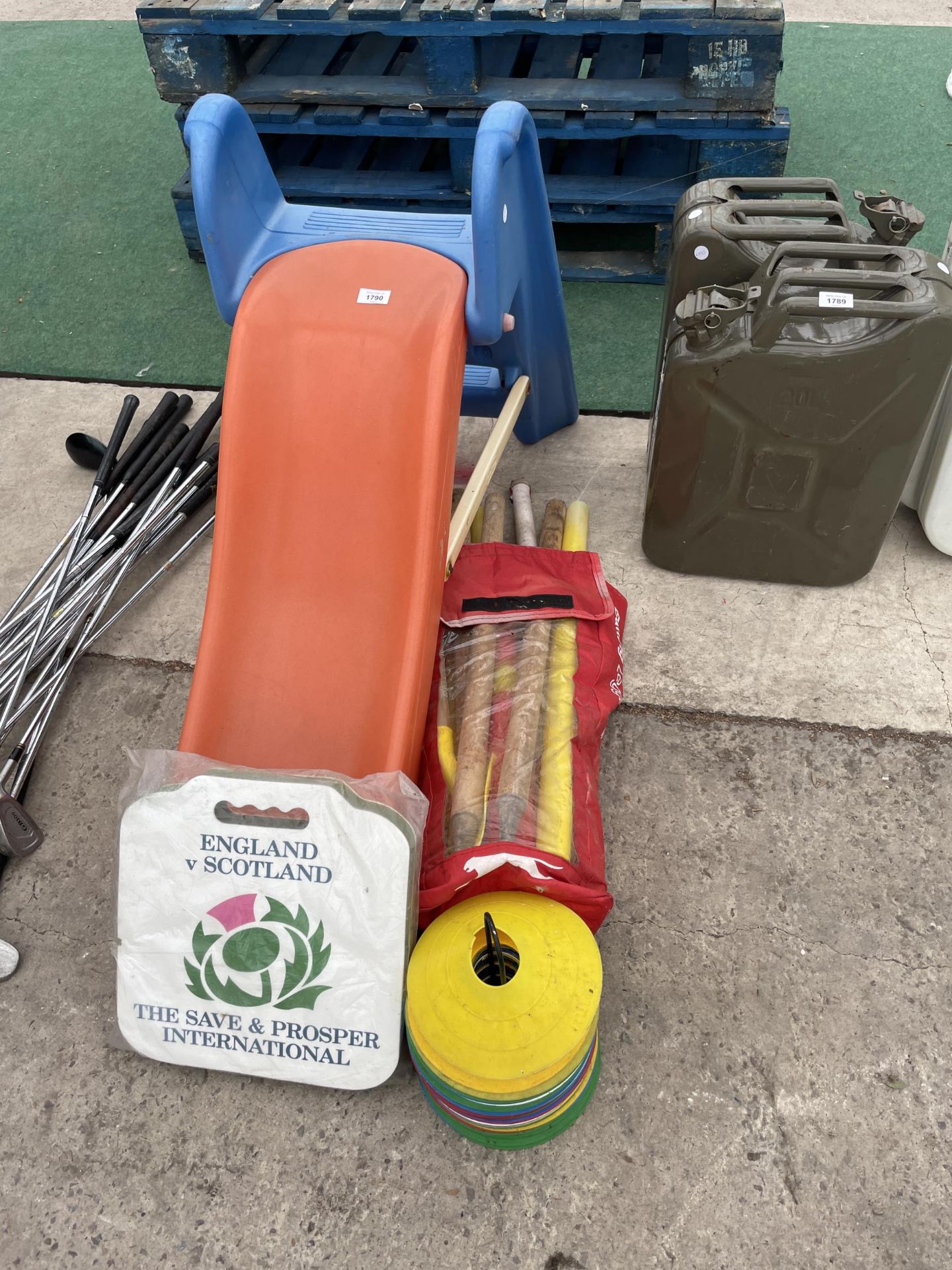 AN ASSORTMENT OF CHILDRENS ITEMS TO INCLUDE A SLIDE AND CRICKET EQUIPMENT