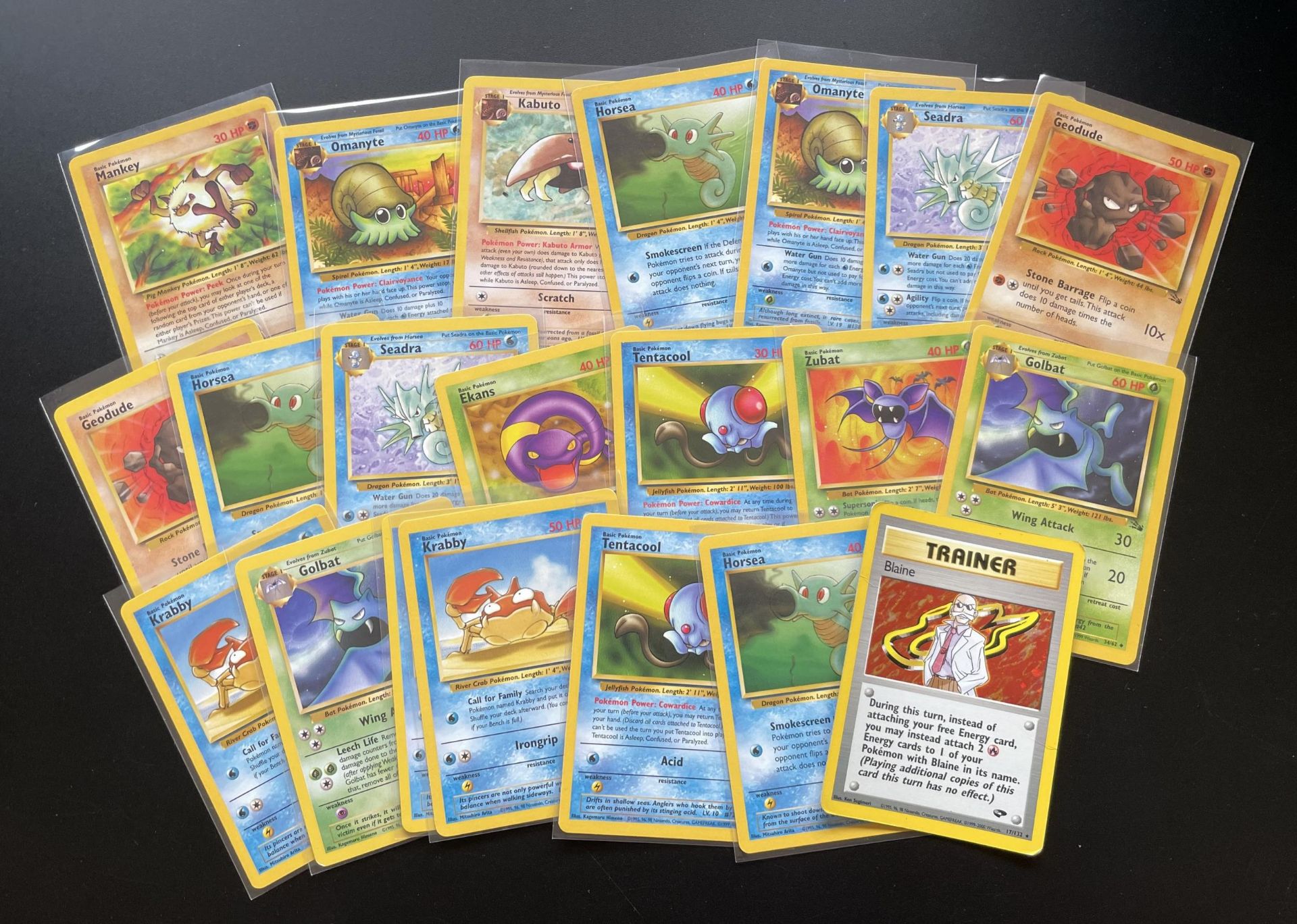 A COLLECTION OF 1999 WOTC POKEMON CARDS, FOSSIL SET, HOLO BLAINE GYM HEROES TRAINER ETC