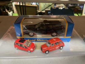 THREE DIE-CAST CARS TO INCLUDE A BOXED ROAD MONSTER