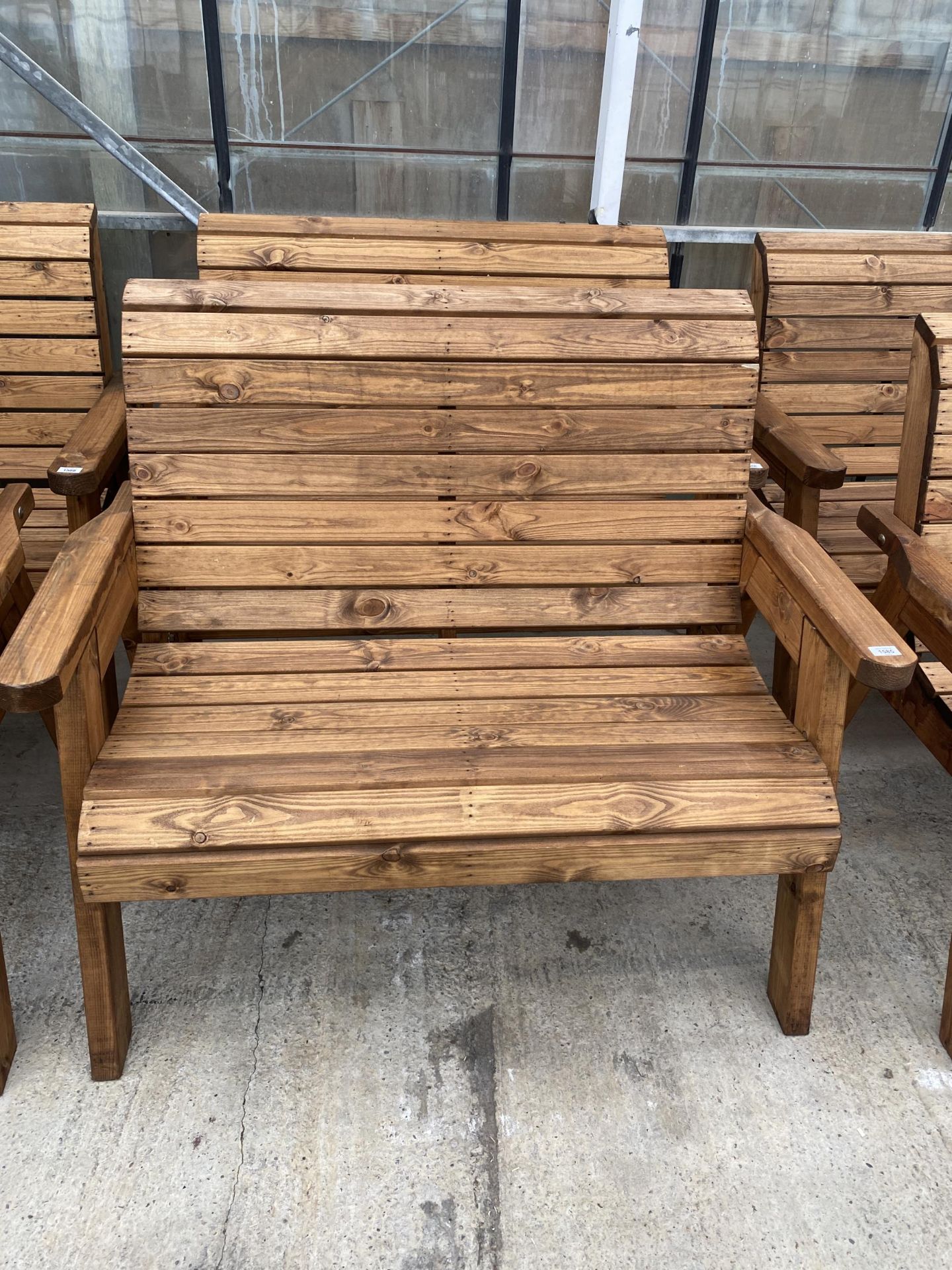 AN AS NEW EXDISPLAY CHARLES TAYLOR TWO SEATER BENCH *PLEASE NOTE VAT TO BE PAID ON THIS LOT*