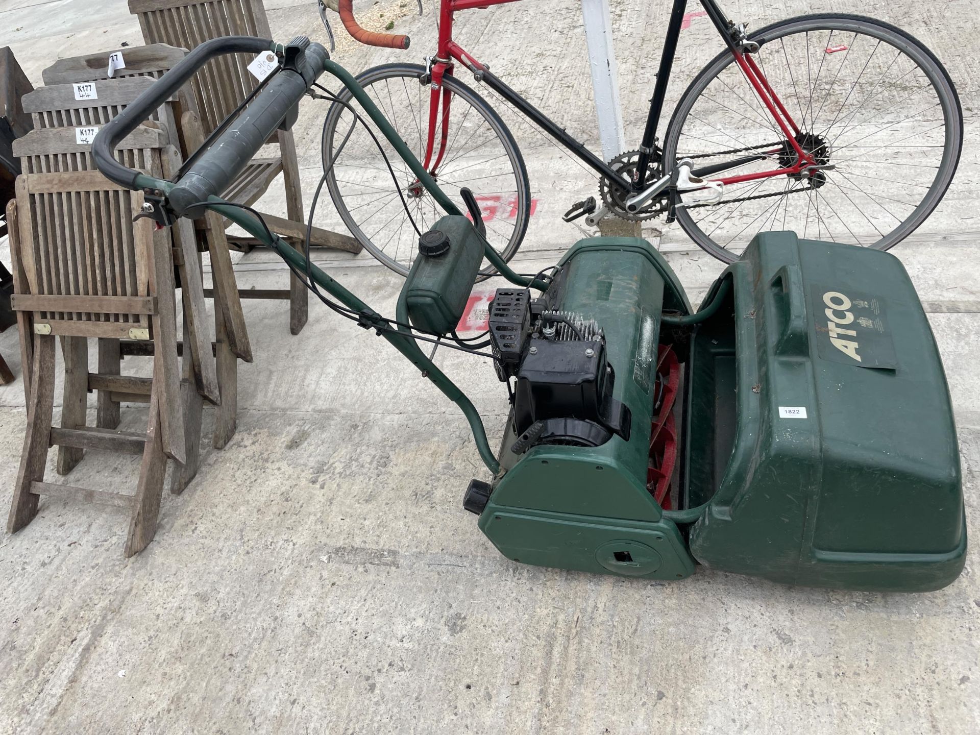 AN ATCO CYLINDER MOWER WITH GRASS BOX BELIEVED IN WORKING ORDER BUT NO WARRANTY
