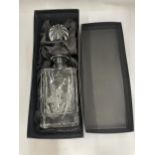 A BOXED ROYAL DOULTON GLASS DECANTER WITH ETCHED FLORAL DESIGN