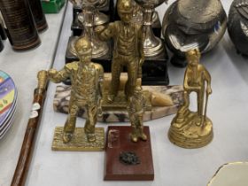 FOUR BRASS FIGURES OF MINERS, ONE ON A MARBLE PLINTH
