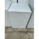 A SMALL WHITE CHEST FREEZER