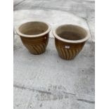 A PAIR OF MEDIUM SIZED BROWN GLAZED POTS